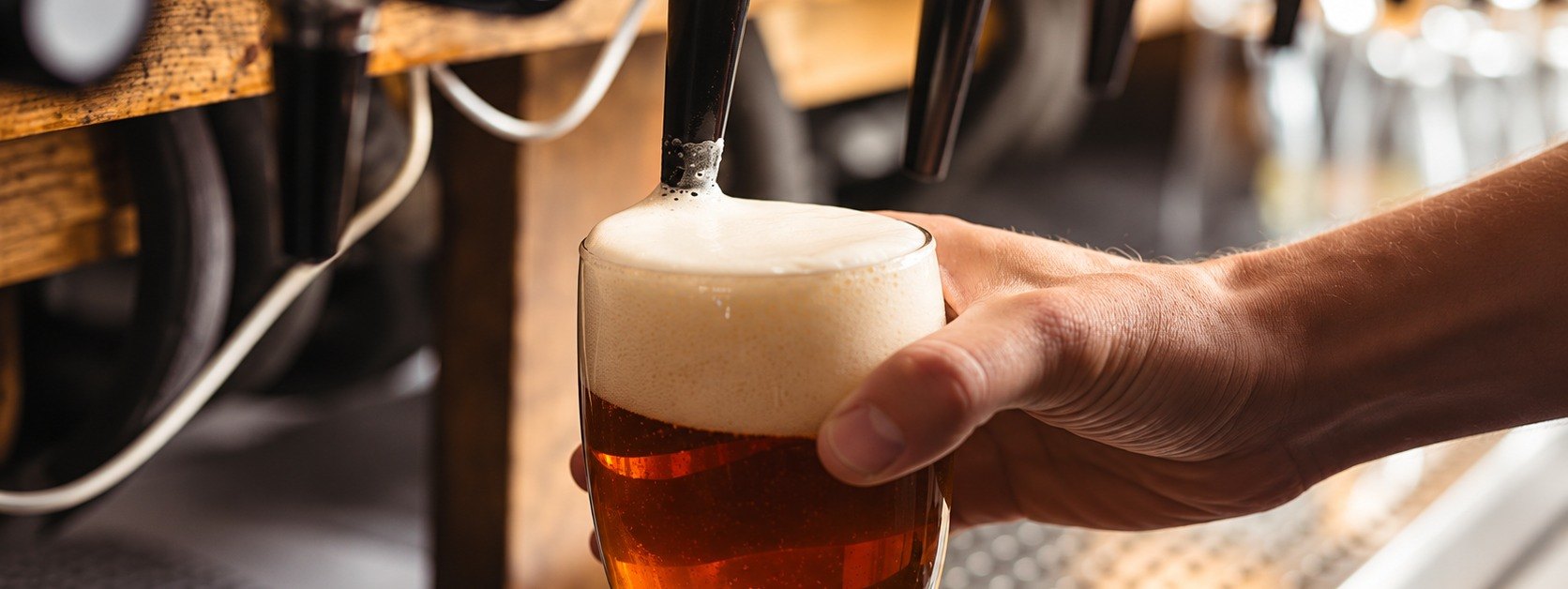 Craft beer poured from the self-pour tap wall at 218 TapHouse in Cloquet, Minnesota