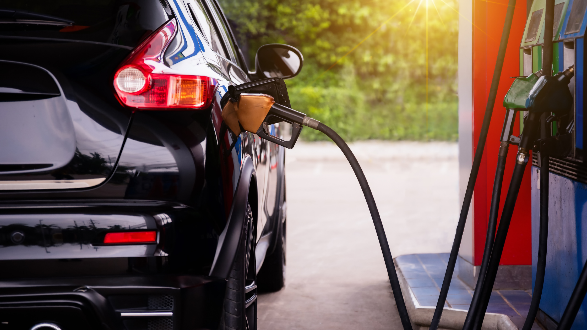 Gas station business professionals strategizing the sale of a gas station, highlighting Meritus Group's expertise in successful transactions.