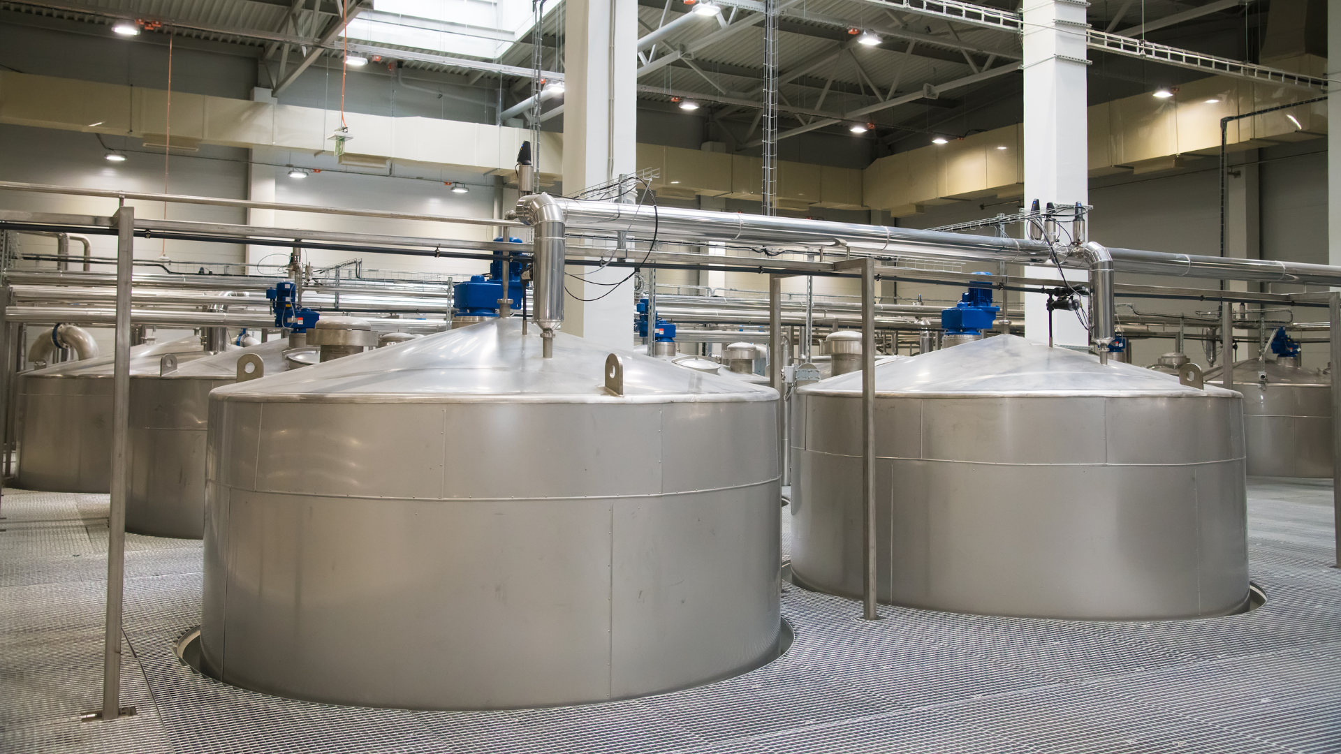 Modern grain processing facility with silos and conveyor systems